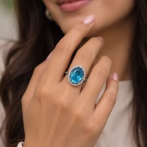 Blue Oval-Cut Halo Statement Ring