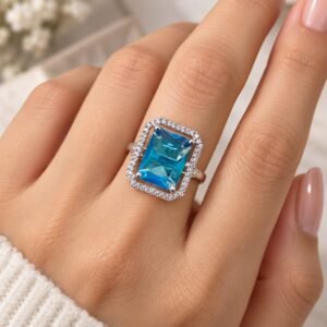 Blue Emerald-Cut Halo Statement Ring
